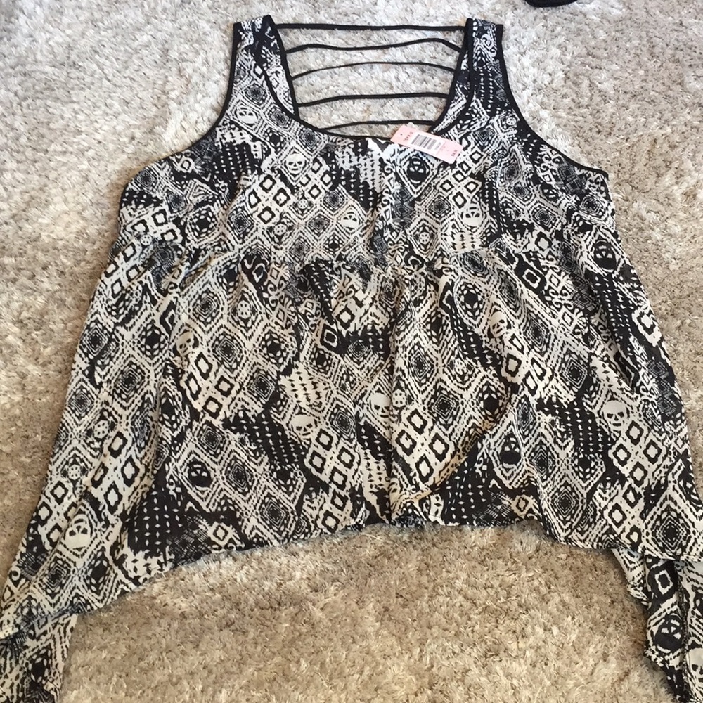 Torrid NWT sheer, shark bite hem top. Size 1